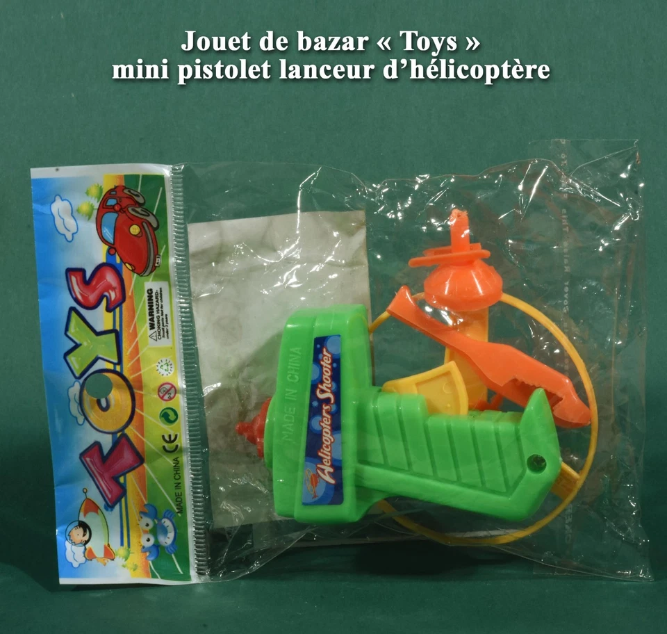 Jouet de bazar « Toys », mini pistolet lanceur d’hélicoptère en sachet scellé - Photo 1/1