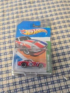Datsun 240Z 2011 Hot Wheels Treasure Hunt 12/15 sellado de fábrica 62/244 - Imagen 1 de 6