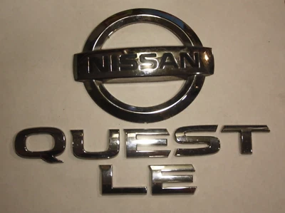 Nissan Quest Le 2011-2017 tapa puerta levadiza trasera cromo emblema conjunto OEM Foto 1 de 2