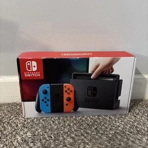 Consola Nintendo Switch con Joy-Con Azul Neón y Rojo Neón - Imagen 1 de 19