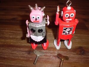 2-  Schylling Red Robot 1998 & Pink Maid 2003 Key Wind Up Tin Robot Toys