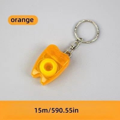 Llavero de limpieza dental portátil de 15 metros de hilo dental 30 piezas colorido Foto 1 de 4