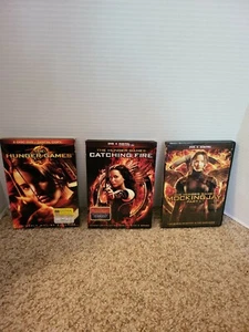 The Hunger Games, Catching Fire, Mockingjay (Part 1) DVD - Picture 1 of 2
