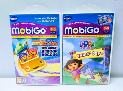 Lot Of (2) Vtech MobiGo Learning Games Team Umizoomi Dora The Explorer Nick - Image 1 of 4