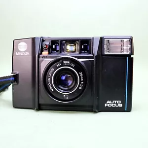 Cámara fotográfica de apuntar y disparar MINOLTA AF-S 35 mm con lente 35/2,8 sin flash en muy buen estado Lomo - Imagen 1 de 6