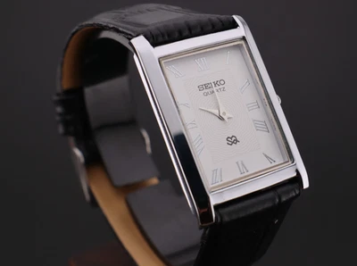 Reloj de pulsera vintage Seiko de cuarzo delgado con esfera blanca para caballeros - ENVÍO GRATUITO Foto 1 de 4