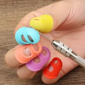 10er Pack Silikon Finger Fingerhut Nähen Gitarre Zählen Geld Wenden Papier - Bild 1 von 12