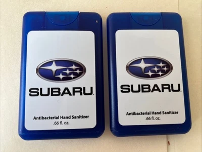 SUBARU DESINFECTANTE DE MANOS MINI PAQUETE DE 2 NUEVO .66oz LOGOTIPO DE AUTO AUTO BOTÍN AZUL PROMOCIÓN Foto 1 de 4