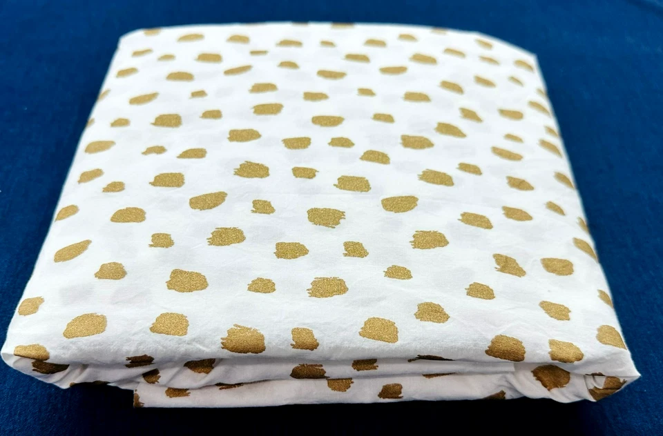 Sábana ajustable Pottery Barn Kids moderna para cuna de bebé puntos dorados 100 % orgánica Foto 1 de 4