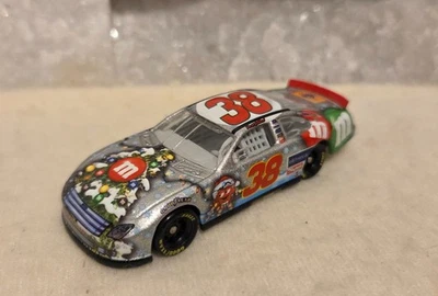 1/64 NASCAR Diecast 2007 David Gilliland #38 M&M's Holiday Pistop Series  Car - Image 1 of 4