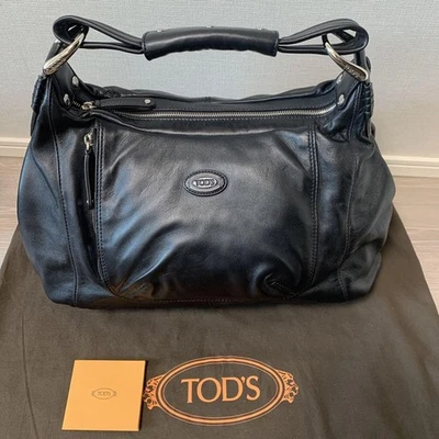Bandolera Tod's compacta de cuero negro usada Foto 1 de 4