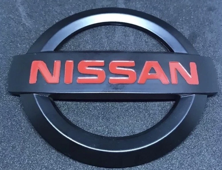 Nissan Máxima 2004-2008 | Insignia emblemas logotipo tapa maletero trasero OEM NUEVO 84890-7Y000 Foto 1 de 3