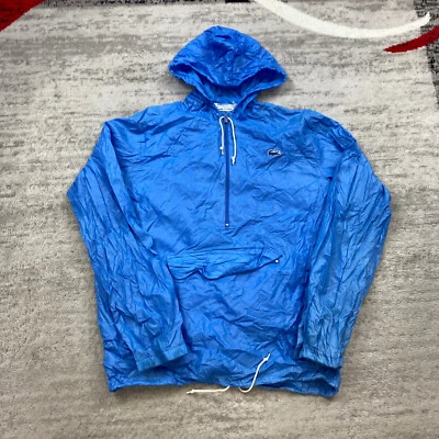 Chaqueta de lluvia vintage Lacoste para dama grande azul cocodrilo abrigo con capucha IZOD para mujer Foto 1 de 4