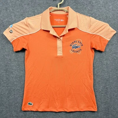Camiseta polo deportiva Lacoste para mujer pequeña FR 34 naranja Miami abierta ajustada de tenis S Foto 1 de 4