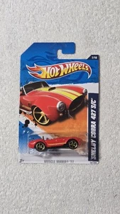Hot Wheels Muscle Mania Shelby Cobra 427 S/C 2011 - Imagen 1 de 1