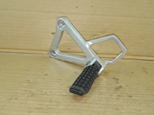 HONDA NS125R 1987-1988 LH Left Front/Rider Footrest & Hanger Assembly - Picture 1 of 8