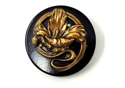 XE Large Black Bakelite Coat Button  w Gold-tone Lily Like Flower - Image 1 of 3