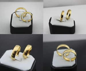 Venta al por mayor lotes de 32 anillos de acero inoxidable de ancho mixto enchapados en oro para mujer y hombre - Imagen 1 de 9