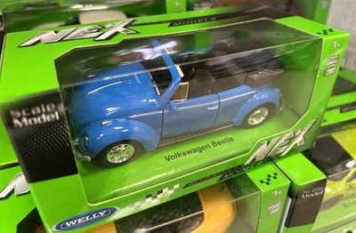 automodello VOLKSWAGEN MAGGIOLINO BEETLE CABRIOLET WELLY metallo APRIBILE 11 CM - Immagine 1 di 3
