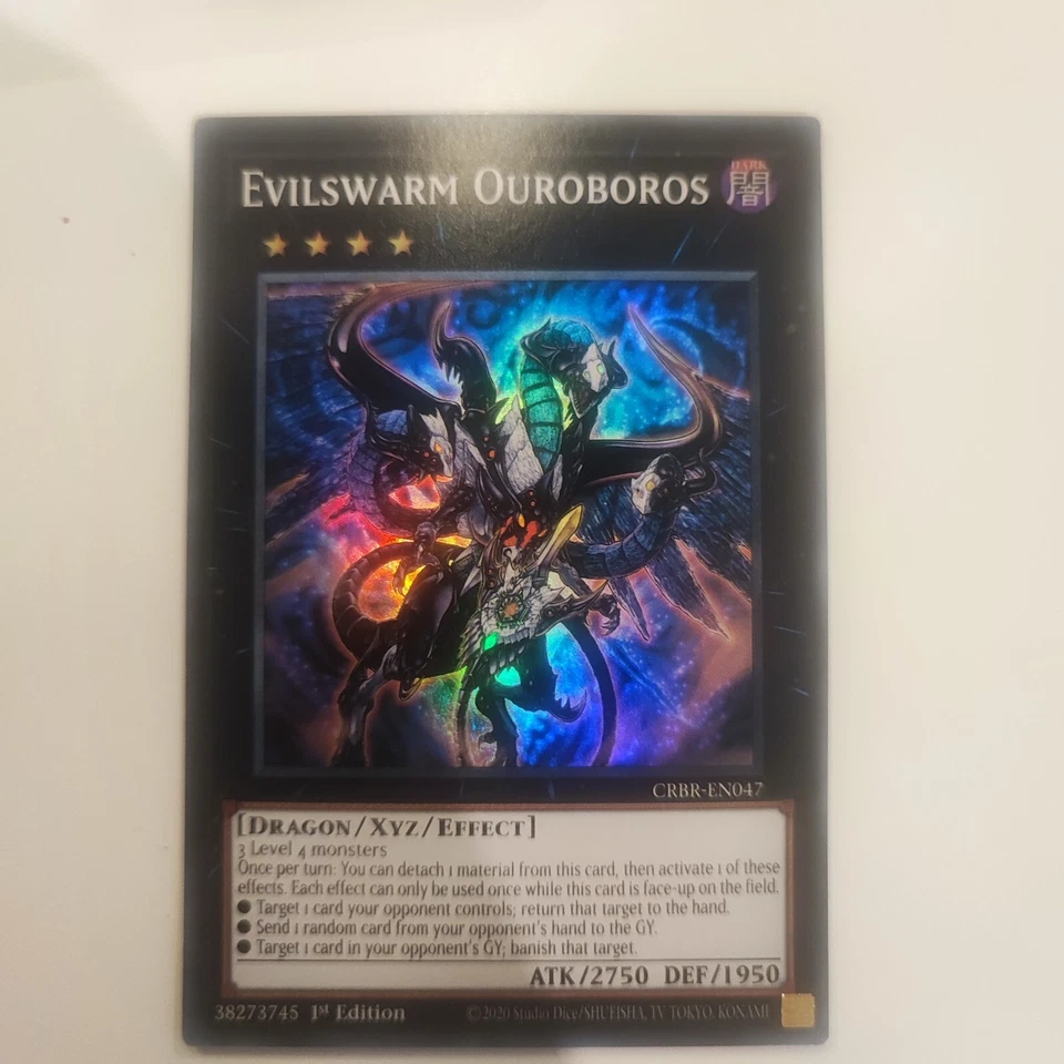 Evilswarm Ouroboros - Super Rare - CRBR-EN047 - Crossover Breakers - EN/NM 1 Edi - Bild 1 von 1