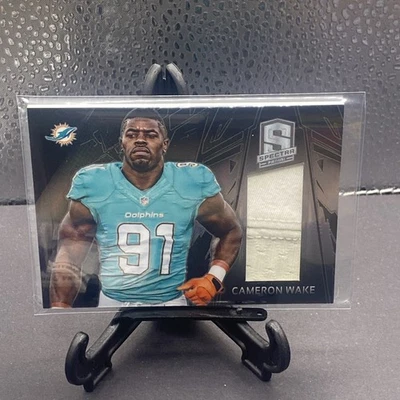2013 Panini Spectra Cameron Wake Game Worn Jersey #292/299 - Image 1 of 2