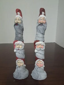 Juego de 2 estatuillas de resina de Papá Noel lápiz apilado - Imagen 1 de 9