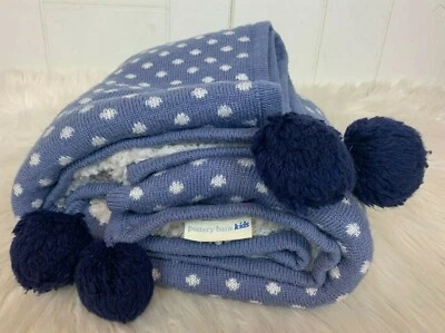 Manta Pottery Barn Kids Lovey azul blanco lunares pompones tejido polar 30x40 Foto 1 de 3