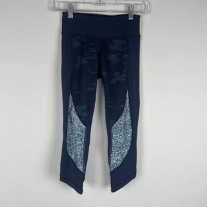 Leggings sportivi Lululemon blu loto mimetico olio slick Wunder sotto crop taglia 2 - Foto 1 di 6
