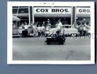 FOUND B&W PHOTO G+2732 SIDE VIEW OF BOY DRIVING SMALL PEDAL JEEP CAR IN PARADE