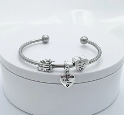 Linx Stainless Steel Bangle with Granddaughter Class Of 2025 Graduation Charms - Image 1 of 4