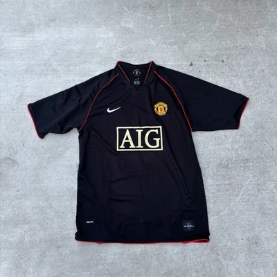 Camiseta Manchester United 2000’s Nike Logo Bordado Talla XL Negra Roja Foto 1 de 4