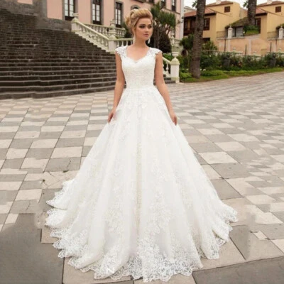 Elegantes vestidos de novia blancos con apliques de cuello en V sin espalda de encaje vestidos de novia personalizados Foto 1 de 4