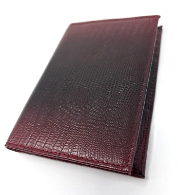 Travelon Genuine Leather Snakeskin Embossed Bi-fold Passport Wallet - Image 1 of 3