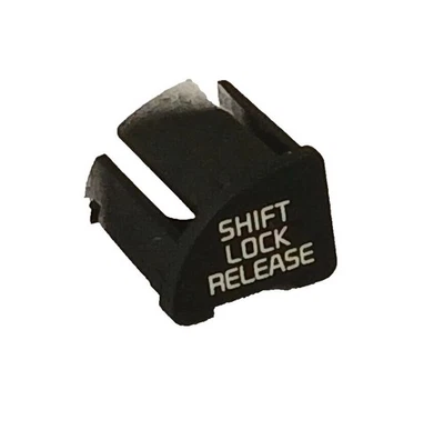 2019-2022 Kia Soul Shift Lock Release Cover 84659-K0004 Kia OEM - Image 1 of 4