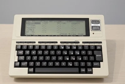 ¡FUNCIONANDO! - TRS‐80 Modelo 100 con acoplador acústico 26‐3805, libros, bolsa de cuero Foto 1 de 4