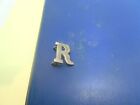 Shoulder Or Collar Badge:  'R'  (White Metal) Police Or Military?