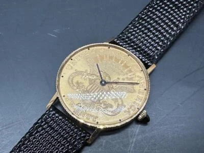 Reloj de vestir vintage Eska con borde de oro de 18 quilates con cara de moneda de Estados Unidos. Foto 1 de 4