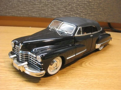 1/18 1947 Cadillac serie 62 recargable convertible, en negro de anson, sin caja Foto 1 de 4