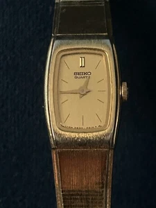 Reloj de cuarzo Seiko para mujer 2E20-5139 tono dorado pulsera caja esfera - Imagen 1 de 4