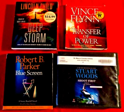 4 Audiobook Lot - by Robert B Parker, Lincoln Child, Stuart Woods, Vince Flynn - Image 1 of 2
