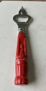 Abridor de botellas contorno Coca Cola vintage con mango de plástico de 6,75 pulgadas de largo - Imagen 1 de 4