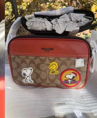 Coach CE746 X Peanuts Graham Crossbody In Signature Canvas With Patches - Image 1 of 4