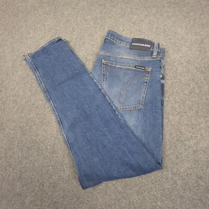 Calvin Klein Jeans Men 33 Blue Denim Slim fit Zip Fly business casual Size 33x32 - Picture 1 of 11
