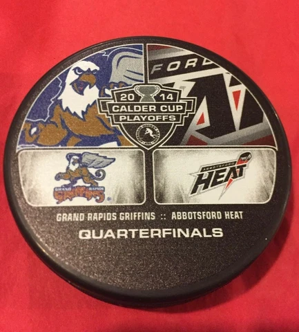 RARE 2014 CALDER CUP PLAYOFFS PUCK GRAND RAPIDS GRIFFINS  VS ABBOTSFORD HEAT Cover