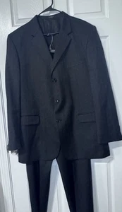 Herren 2 Teiler Anzug 50R Sakko & Hose 42 Taille Jones New York Schwarz 2-teilig 100% Wolle - Bild 1 von 3