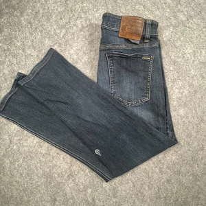 Herren Gr. 31 Volcom Vorta Jeans Slim Fit Dark Wash Blau Denim Super Stretch - Bild 1 von 15