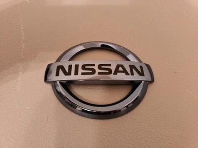 Nissan Leaf 2011-2017 OEM parrilla delantera emblema azul hielo muy buen estado (#1) Foto 1 de 4