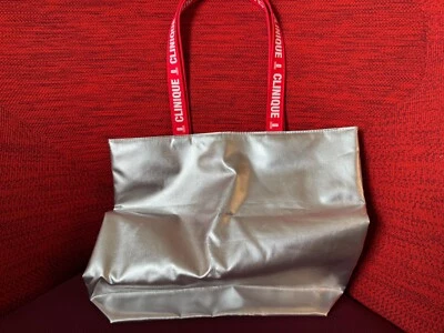 ~Clinique Metallic Silver Tote Bag with Red Handles - good condition - Image 1 of 3