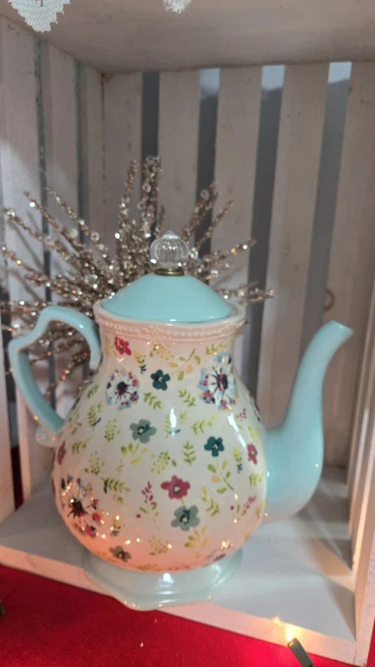 Tetera Pioneer para mujer Foto 1 de 4