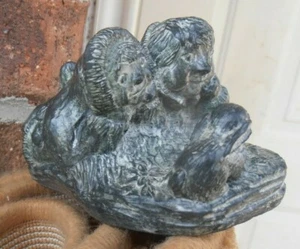 Inuit/Eskimo Soapstone Carving Wolf Sculptures     - children watching a bunny - Picture 1 of 6
